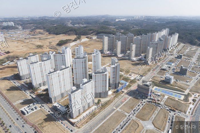 수청동 일대 신축 아파트 단지가 들어서 있다.